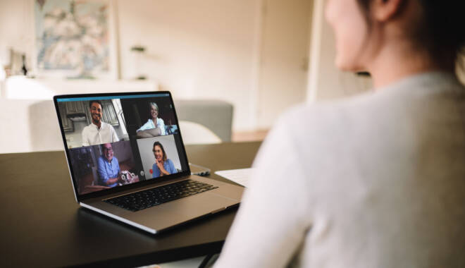 Woman sitting on a video conference call on her laptop
