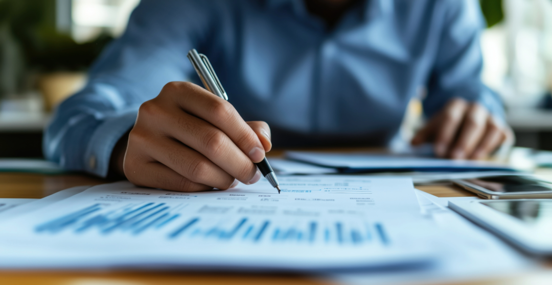 picture of an adult filling out paperwork