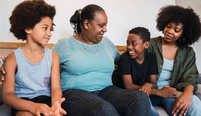 family sitting on a couch