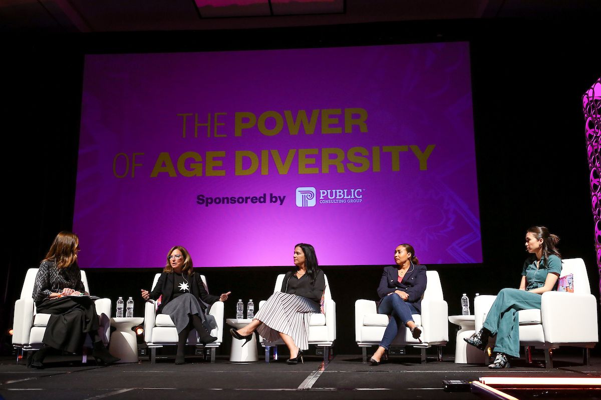Women discussing on The power of age diversity panel on stage