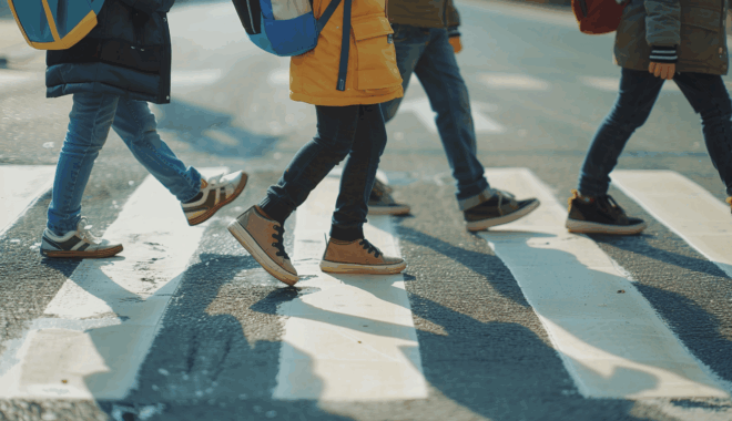 children crossing the street to school
