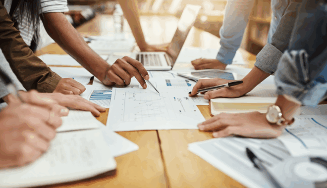 people working together through a budget