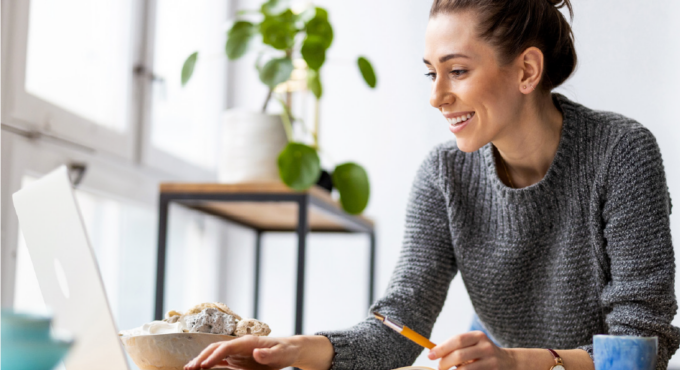 Lady smiling at desk
