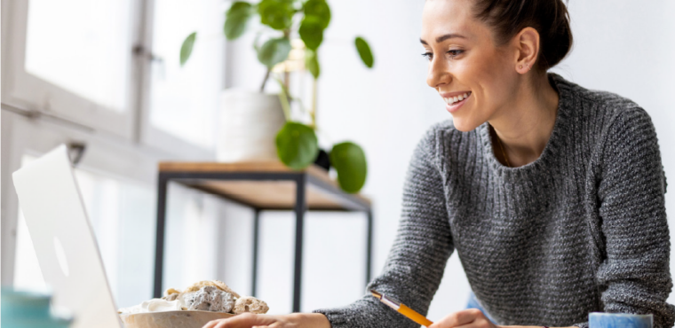 Lady smiling at desk