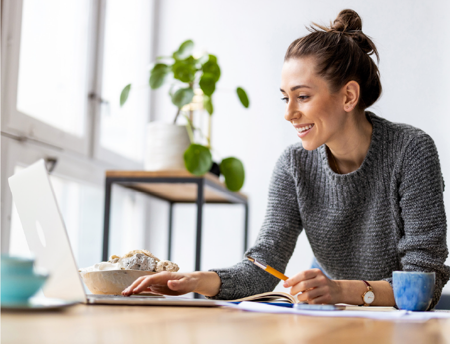 Lady smiling at desk